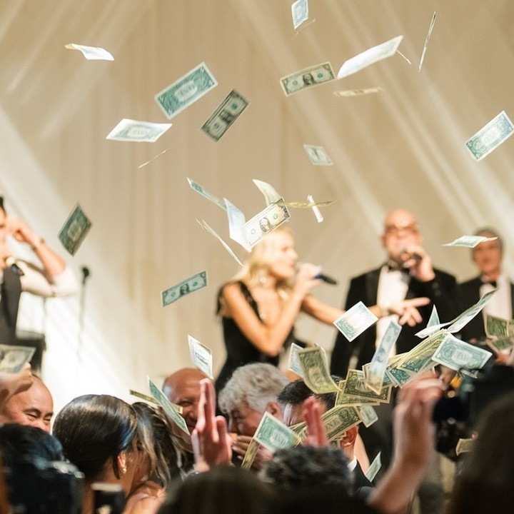 Money toss on the dance floor with Rouge Band by LIV Entertainment