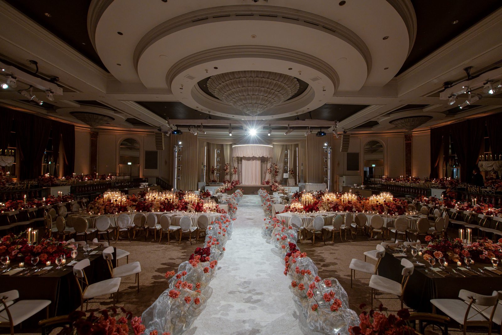 Beverly Wilshire ballroom set for a wedding with LIV Entertainment sound and lighting rigged either side of the stage