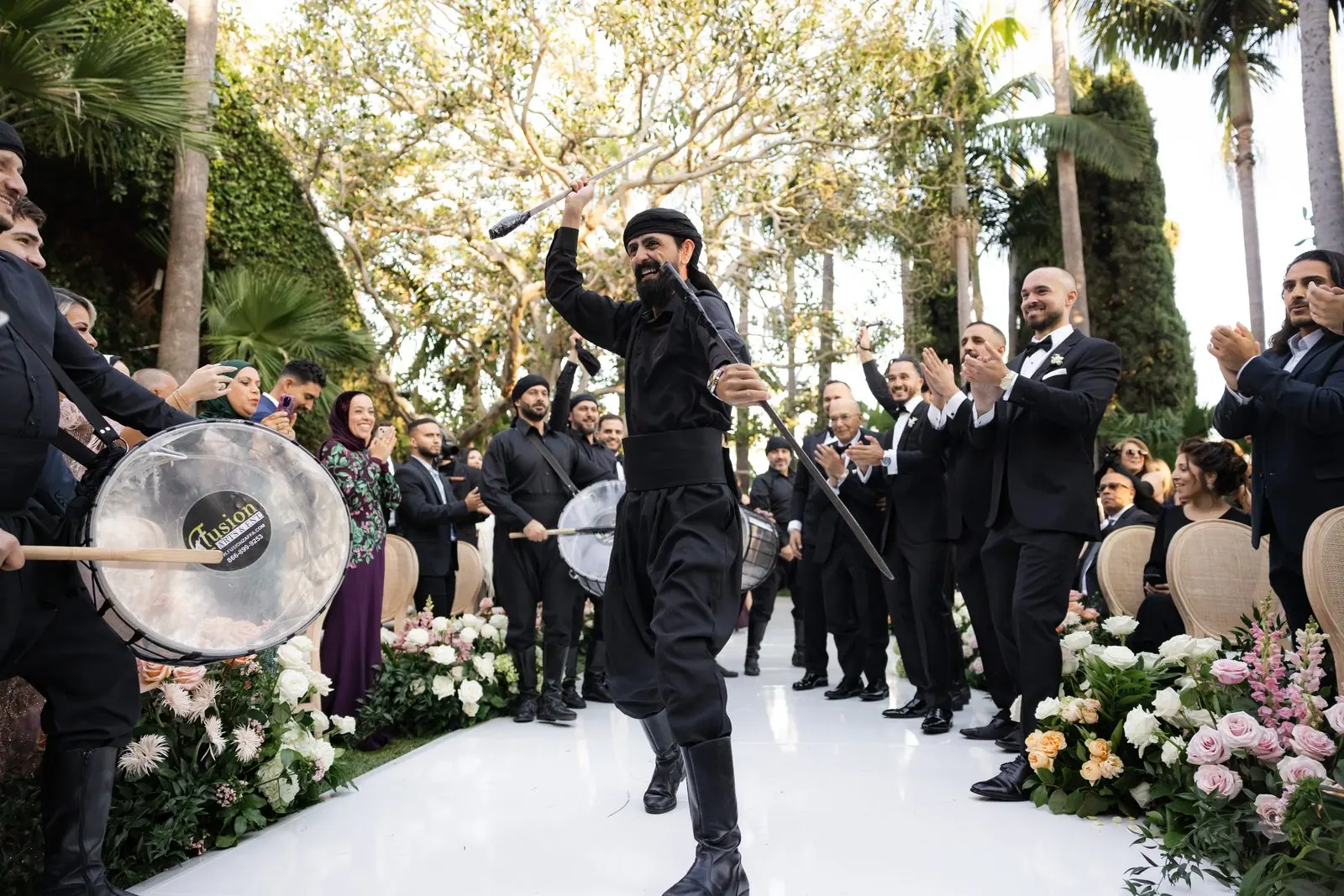 LIV Entertainment percussion players leading a wedding procession